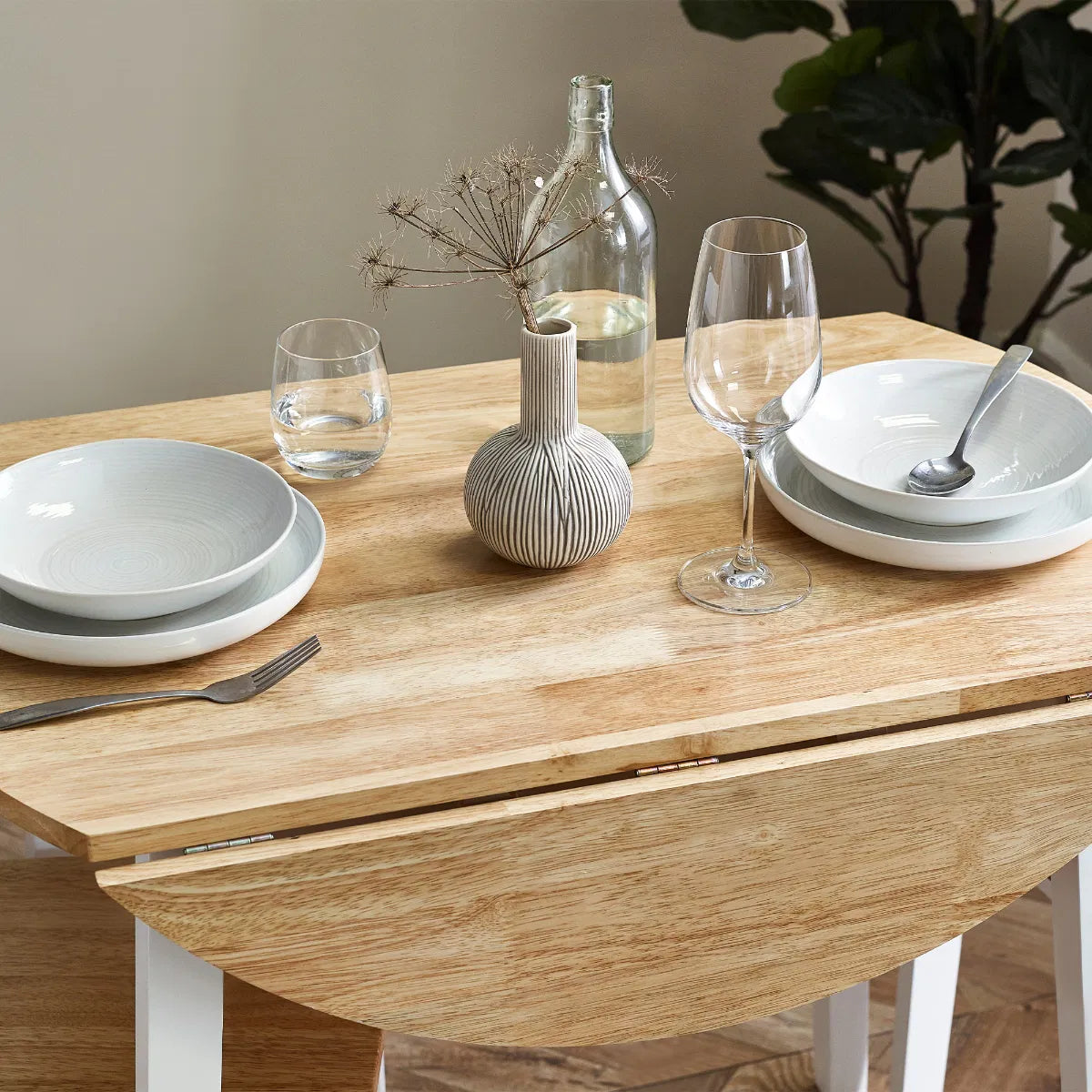 Linwood Round Dropleaf Extendable Dining Table