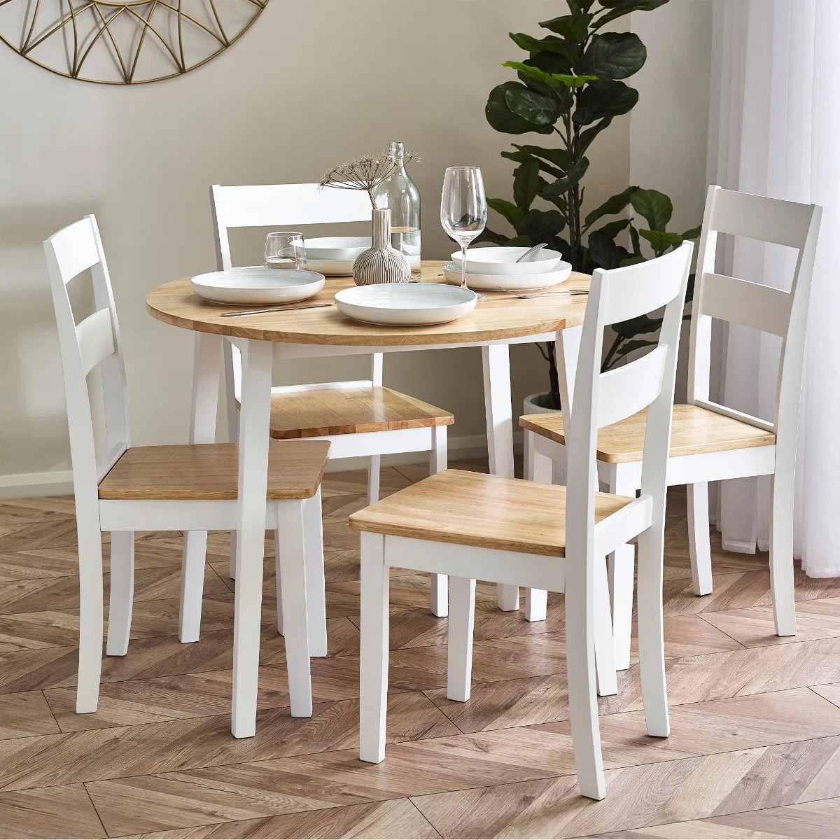 Linwood Round Dropleaf Extendable Dining Table